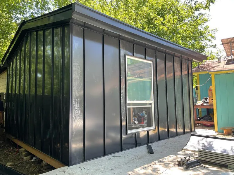 Black standing seam metal wall panels for Roof Inspection in New Milford